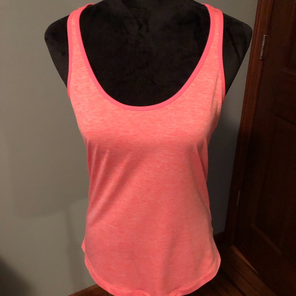 Racerback style fitness tank, size Medium in excellent condition.